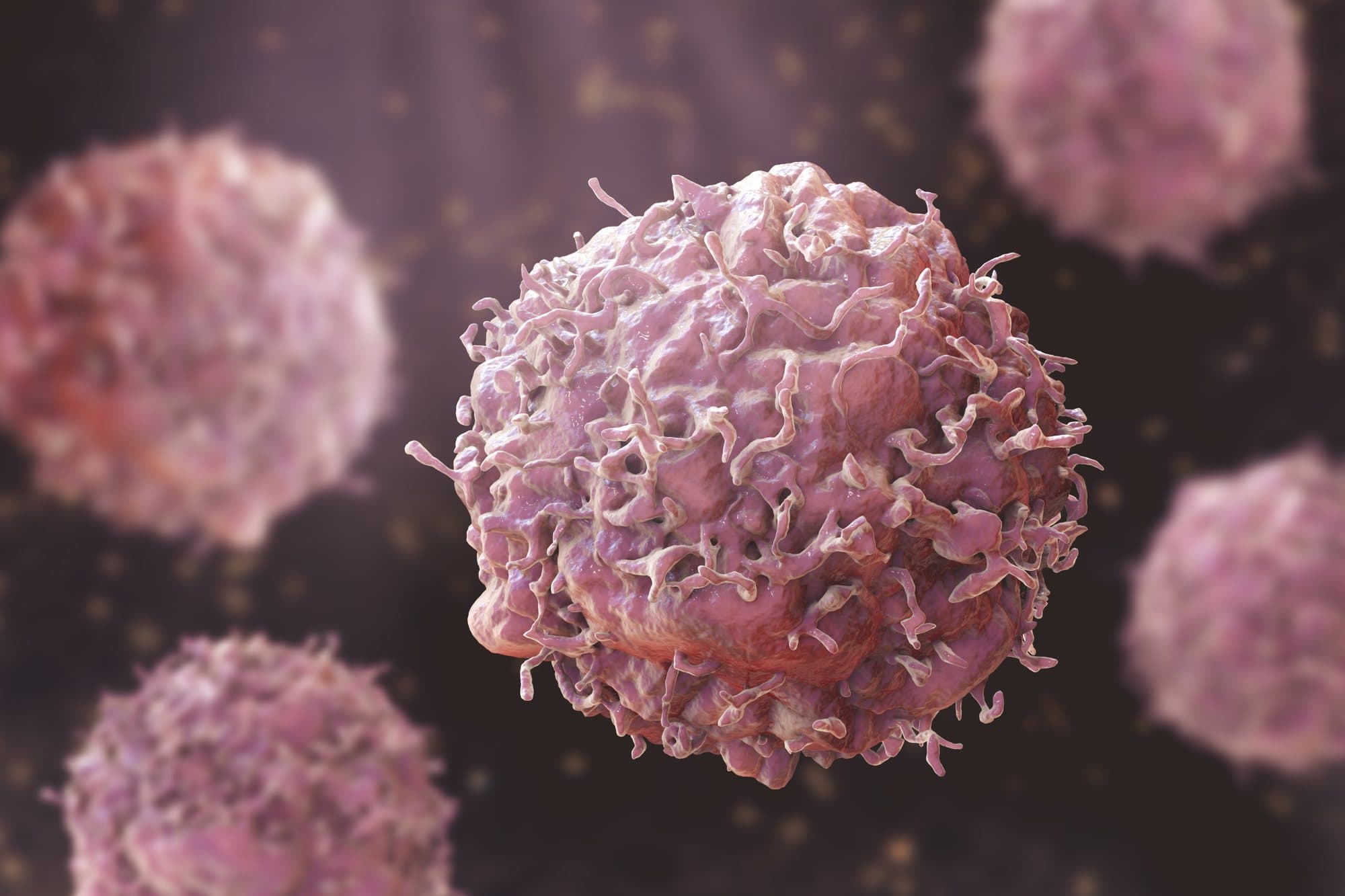 A rendering of rounded cells with textured surfaces, one in focus in front of others